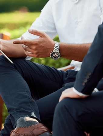 A consultant talking a client through project notes